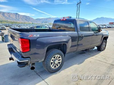Trzecie zdjęcie samochodu z tyłu: 2015 CHEVROLET SILVERADO LT VIN:1GC4KZC89GF146468 - miniatura