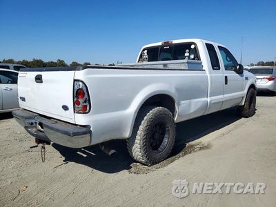 Trzecie zdjęcie samochodu z tyłu: 2002 FORD F250 SUPER DUTY VIN:1FTNX20S32EA79295 - miniatura