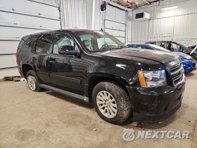Czwarte zdjęcie samochodu z boku: 2012 CHEVROLET TAHOE HYBRID VIN:1GNSKDEJ1CR225546 - miniatura