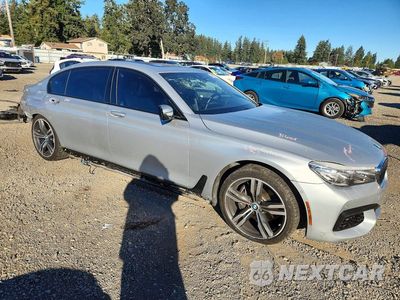 Czwarte zdjęcie samochodu z boku: 2016 BMW 740 I VIN:WBA7E2C58GG547650 - miniatura