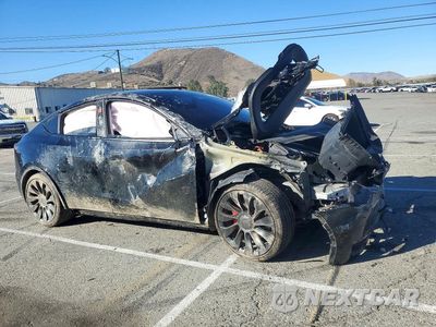 Czwarte zdjęcie samochodu z boku: 2023 TESLA MODEL Y VIN:7SAYGDEF2PF764997 - miniatura