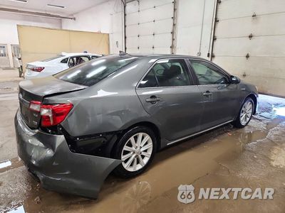 Trzecie zdjęcie samochodu z tyłu: 2012 TOYOTA CAMRY HYBRID XLE VIN:4T1BD1FK2CU056641 - miniatura