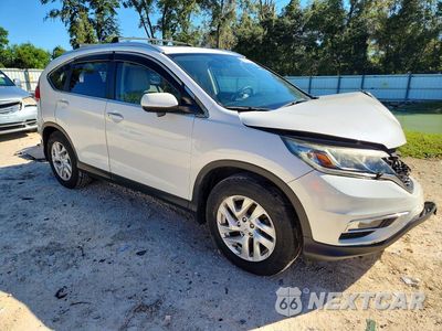Czwarte zdjęcie samochodu z boku: 2016 HONDA CR-V EXL VIN:5J6RM3H70GL019326 - miniatura