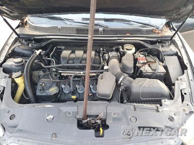 Zdjęcie 11 z 12 samochodu: 2013 FORD TAURUS SEL VIN:1FAHP2H81DG230203 - miniatura