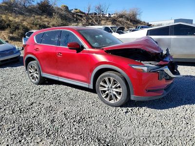 Czwarte zdjęcie samochodu z boku: 2021 MAZDA CX-5 GRAND TOURING VIN:JM3KFBDM0M1497252 - miniatura