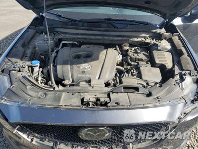 Zdjęcie 12 z 13 samochodu: 2021 MAZDA CX-5 TOURING VIN:JM3KFBCM1M0404813 - miniatura