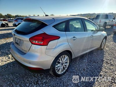 Trzecie zdjęcie samochodu z tyłu: 2017 FORD FOCUS TITANIUM VIN:1FADP3N28HL287595 - miniatura