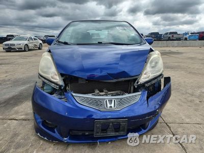 Piąte zdjęcie samochodu w środku: 2009 HONDA FIT SPORT VIN:JHMGE88469S021361 - miniatura