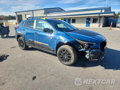 Czwarte zdjęcie samochodu z boku: 2024 SUBARU CROSSTREK WILDERNESS VIN:4S4GUHU60R3742969 - miniatura
