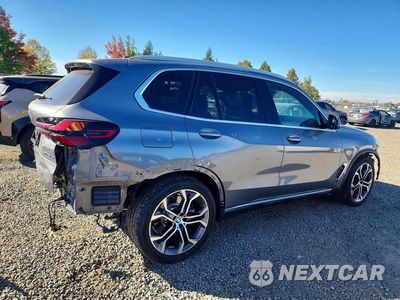 Trzecie zdjęcie samochodu z tyłu: 2026 BMW X5 XDRIVE50E VIN:5UX43EU00T9314410 - miniatura