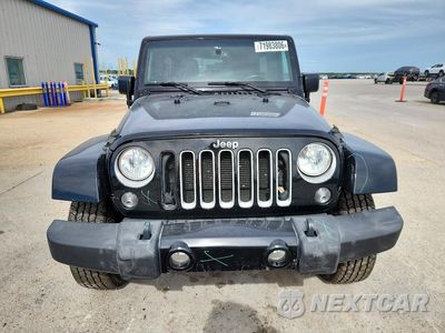 Piąte zdjęcie samochodu w środku: 2016 JEEP WRANGLER UNLIMITED SAHARA VIN:1C4BJWEGXGL114479 - miniatura