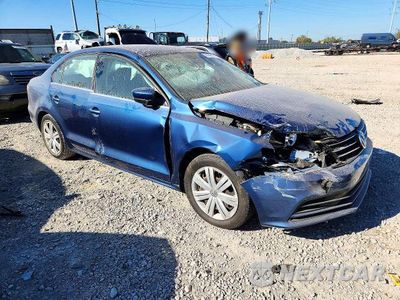 Czwarte zdjęcie samochodu z boku: 2017 VOLKSWAGEN JETTA S VIN:3VW2B7AJ1HM268497 - miniatura