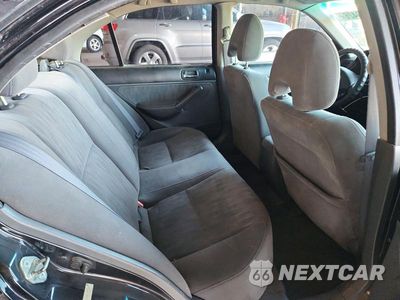 Zdjęcie 12 z 14 samochodu: 2004 HONDA CIVIC LX VIN:1HGES16524L021334 - miniatura