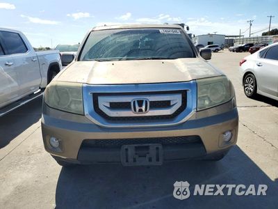 Piąte zdjęcie samochodu w środku: 2009 HONDA PILOT EXL VIN:5FNYF38509B017818 - miniatura