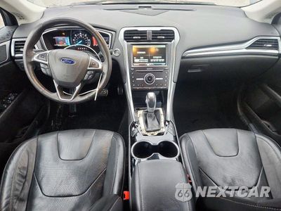 Zdjęcie 8 z 13 samochodu: 2016 FORD FUSION TITANIUM PHEV VIN:3FA6P0SU3GR121627 - miniatura
