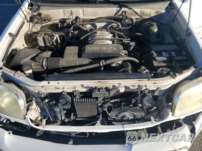 Zdjęcie 12 z 13 samochodu: 2002 TOYOTA SEQUOIA LIMITED VIN:5TDZT38A12S137400 - miniatura