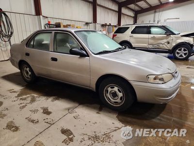 Czwarte zdjęcie samochodu z boku: 1999 TOYOTA COROLLA VE VIN:1NXBR12E8XZ183529 - miniatura