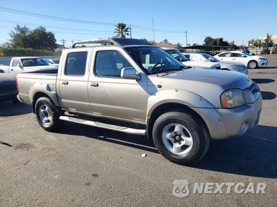 Czwarte zdjęcie samochodu z boku: 2001 NISSAN FRONTIER XE VIN:1N6ED27T11C322004 - miniatura