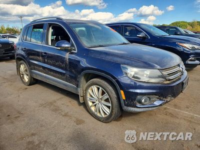 Czwarte zdjęcie samochodu z boku: 2013 VOLKSWAGEN TIGUAN S VIN:WVGBV3AXXDW599043 - miniatura