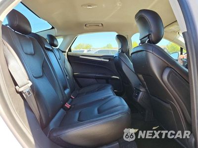 Zdjęcie 10 z 12 samochodu: 2014 FORD FUSION TITANIUM VIN:3FA6P0K93ER190424 - miniatura