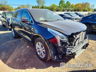 Czwarte zdjęcie samochodu z boku: 2022 CADILLAC XT5 PREMIUM LUXURY VIN:1GYKNDRSXNZ105731 - miniatura