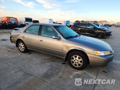 Czwarte zdjęcie samochodu z boku: 1999 TOYOTA CAMRY LE VIN:JT2BG22K0X0378529 - miniatura