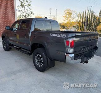 Trzecie zdjęcie samochodu z tyłu: 2023 TOYOTA TACOMA TRD OFF-ROAD VIN:3TMCZ5AN7PM598931 - miniatura