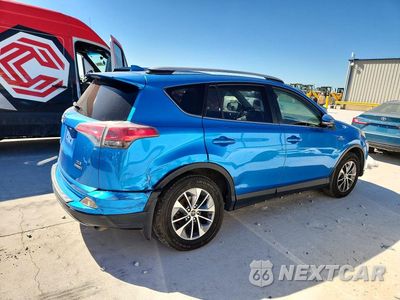 Trzecie zdjęcie samochodu z tyłu: 2017 TOYOTA RAV4 HYBRID XLE VIN:JTMRJREV9HD115732 - miniatura
