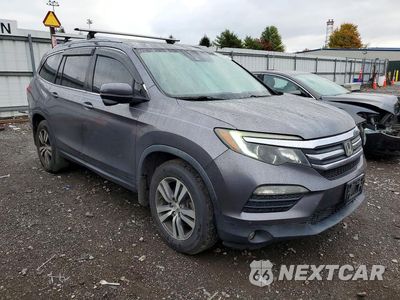 Czwarte zdjęcie samochodu z boku: 2017 HONDA PILOT EXL VIN:5FNYF6H65HB016771 - miniatura