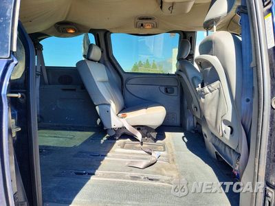 Zdjęcie 11 z 13 samochodu: 2004 DODGE GRAND CARAVAN SXT VIN:2D4GP44L74R519759 - miniatura