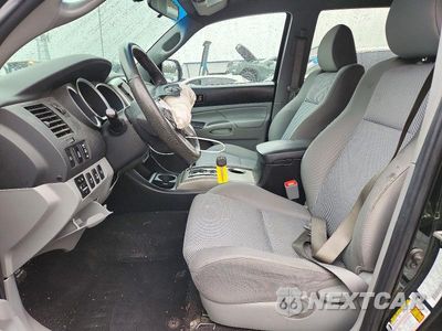Zdjęcie 7 z 12 samochodu: 2014 TOYOTA TACOMA V6 VIN:3TMLU4EN8EM145871 - miniatura