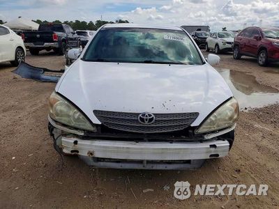 Piąte zdjęcie samochodu w środku: 2004 TOYOTA CAMRY LE VIN:JTDBE32K540262774 - miniatura