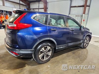 Trzecie zdjęcie samochodu z tyłu: 2017 HONDA CR-V LX VIN:2HKRW6H39HH211901 - miniatura