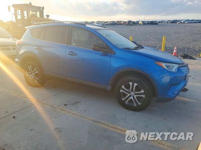 Czwarte zdjęcie samochodu z boku: 2017 TOYOTA RAV4 LE VIN:JTMBFREV3HJ157964 - miniatura