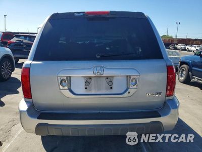 Zdjęcie 6 z 13 samochodu: 2003 HONDA PILOT LX VIN:2HKYF18143H608860 - miniatura