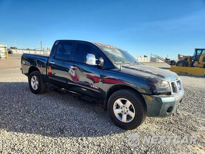 Czwarte zdjęcie samochodu z boku: 2005 NISSAN TITAN XE VIN:1N6AA07BX5N543453 - miniatura