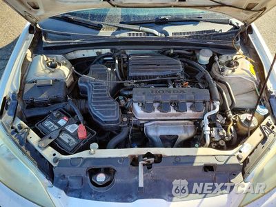 Zdjęcie 11 z 12 samochodu: 2004 HONDA CIVIC DX VIN:2HGES164X4H593935 - miniatura