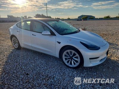 Czwarte zdjęcie samochodu z boku: 2021 TESLA MODEL 3 VIN:5YJ3E1EA6MF990360 - miniatura