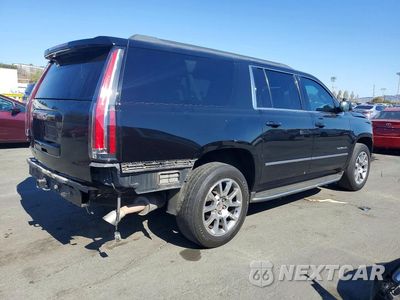 Trzecie zdjęcie samochodu z tyłu: 2016 GMC YUKON XL C1500 SLE VIN:1GKS1FKCXGR418382 - miniatura
