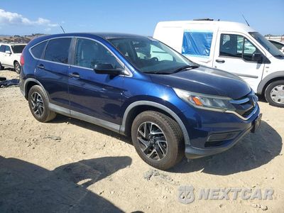 Czwarte zdjęcie samochodu z boku: 2016 HONDA CR-V SE VIN:2HKRM4H4XGH668458 - miniatura