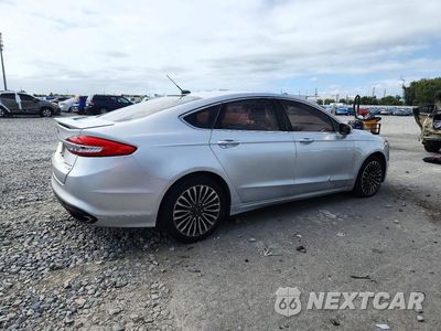 Trzecie zdjęcie samochodu z tyłu: 2017 FORD FUSION TITANIUM VIN:3FA6P0K91HR130727 - miniatura