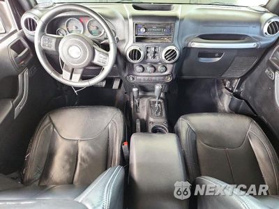 Zdjęcie 8 z 12 samochodu: 2015 JEEP WRANGLER UNLIMITED SAHARA VIN:1C4BJWEG4FL630318 - miniatura