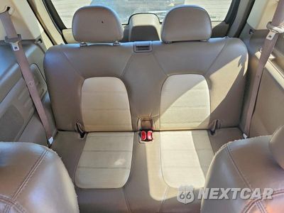 Zdjęcie 10 z 13 samochodu: 2004 FORD EXPLORER EDDIE BAUER VIN:1FMZU64K34ZA78196 - miniatura