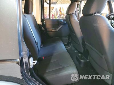 Zdjęcie 10 z 12 samochodu: 2015 JEEP WRANGLER UNLIMITED SPORT VIN:1C4BJWDG1FL761014 - miniatura
