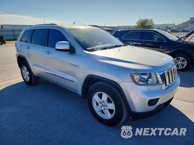 Czwarte zdjęcie samochodu z boku: 2012 JEEP GRAND CHEROKEE LAREDO VIN:1C4RJFAG5CC141460 - miniatura