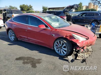 Czwarte zdjęcie samochodu z boku: 2018 TESLA MODEL 3 VIN:5YJ3E1EB5JF083619 - miniatura