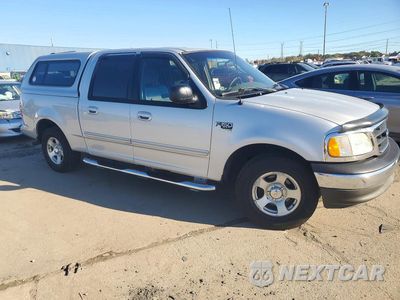 Czwarte zdjęcie samochodu z boku: 2003 FORD F150 SUPERCREW VIN:1FTRW07663KD16897 - miniatura