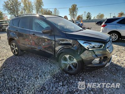 Czwarte zdjęcie samochodu z boku: 2017 FORD ESCAPE SE VIN:1FMCU9GD6HUD07476 - miniatura