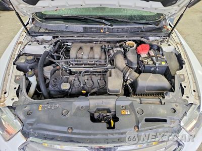 Zdjęcie 11 z 12 samochodu: 2013 FORD TAURUS SEL VIN:1FAHP2E80DG152159 - miniatura
