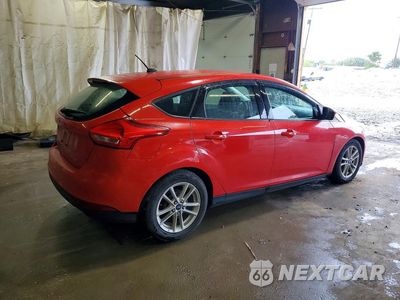 Trzecie zdjęcie samochodu z tyłu: 2017 FORD FOCUS SE VIN:1FADP3K20HL278989 - miniatura